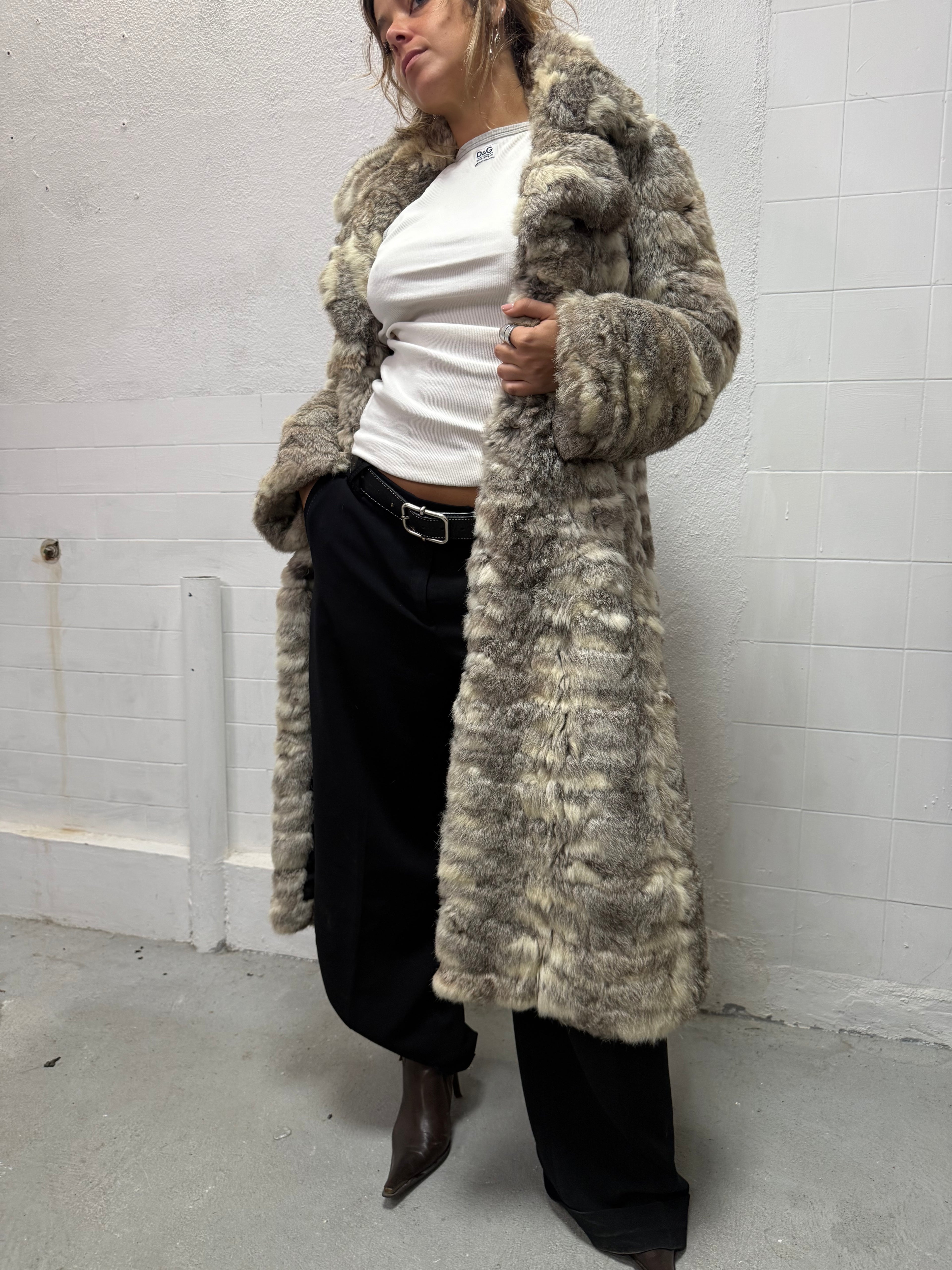 Real fur long coat shown on EU M model
