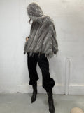 Real fur hood poncho worn by model