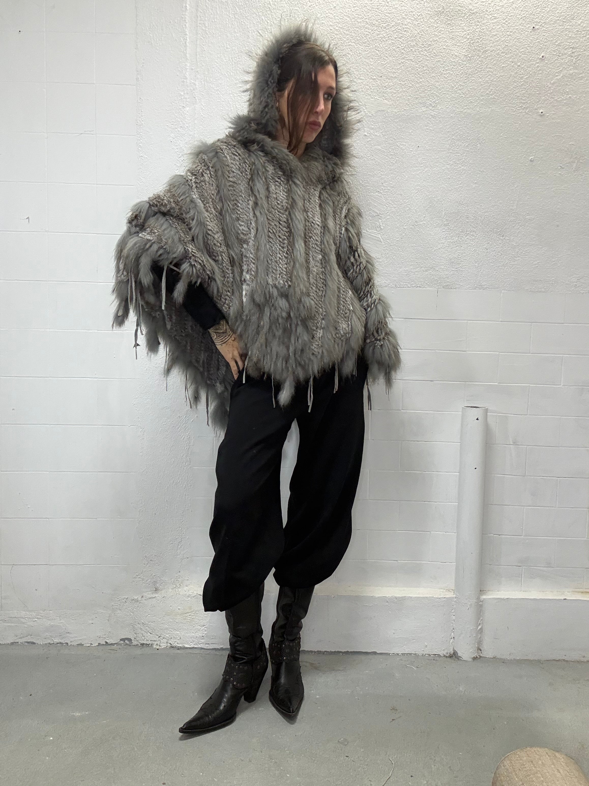 Statement real fur hood poncho photographed in studio