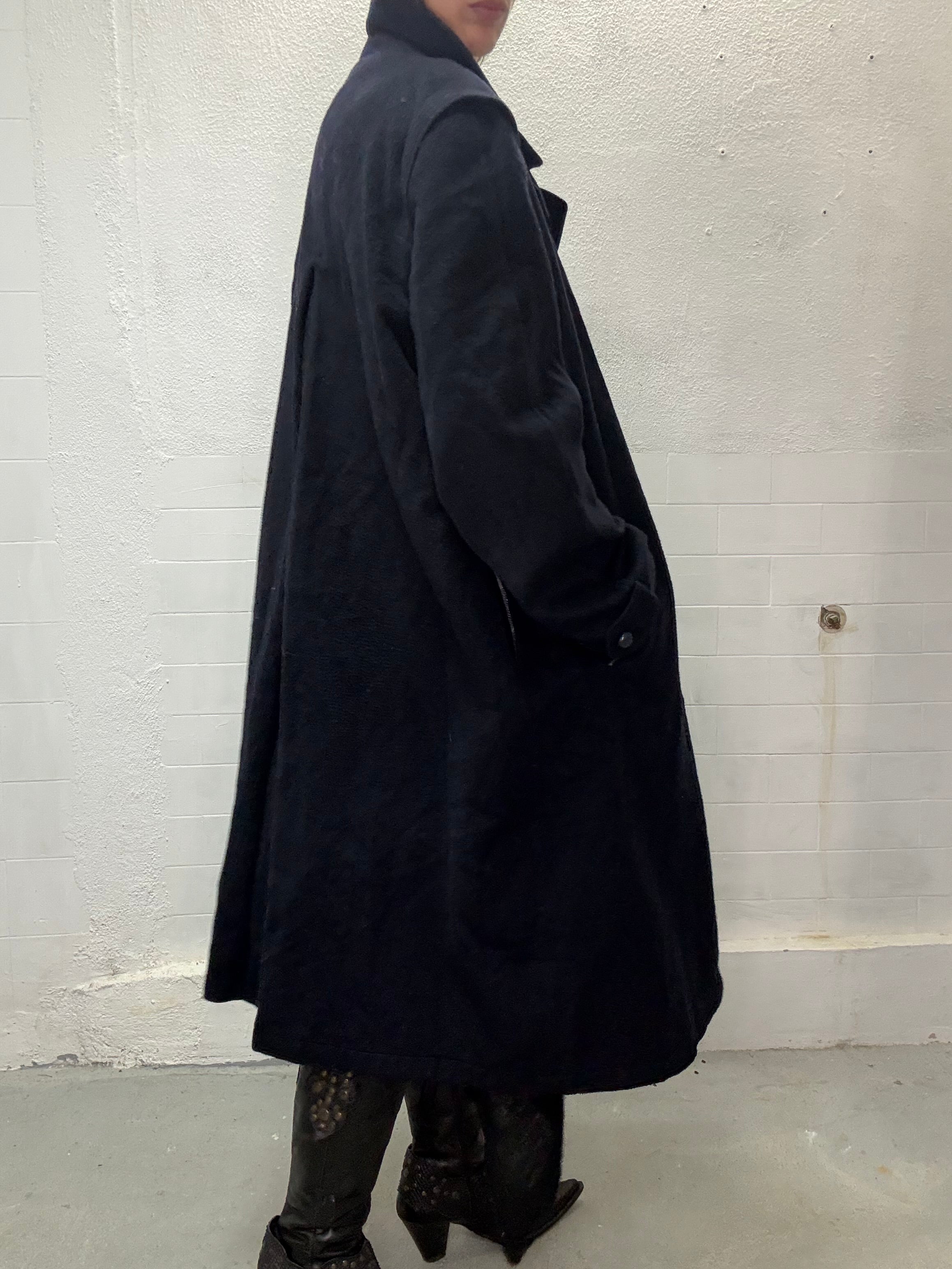 Long wool coat in deep navy with structured shoulders