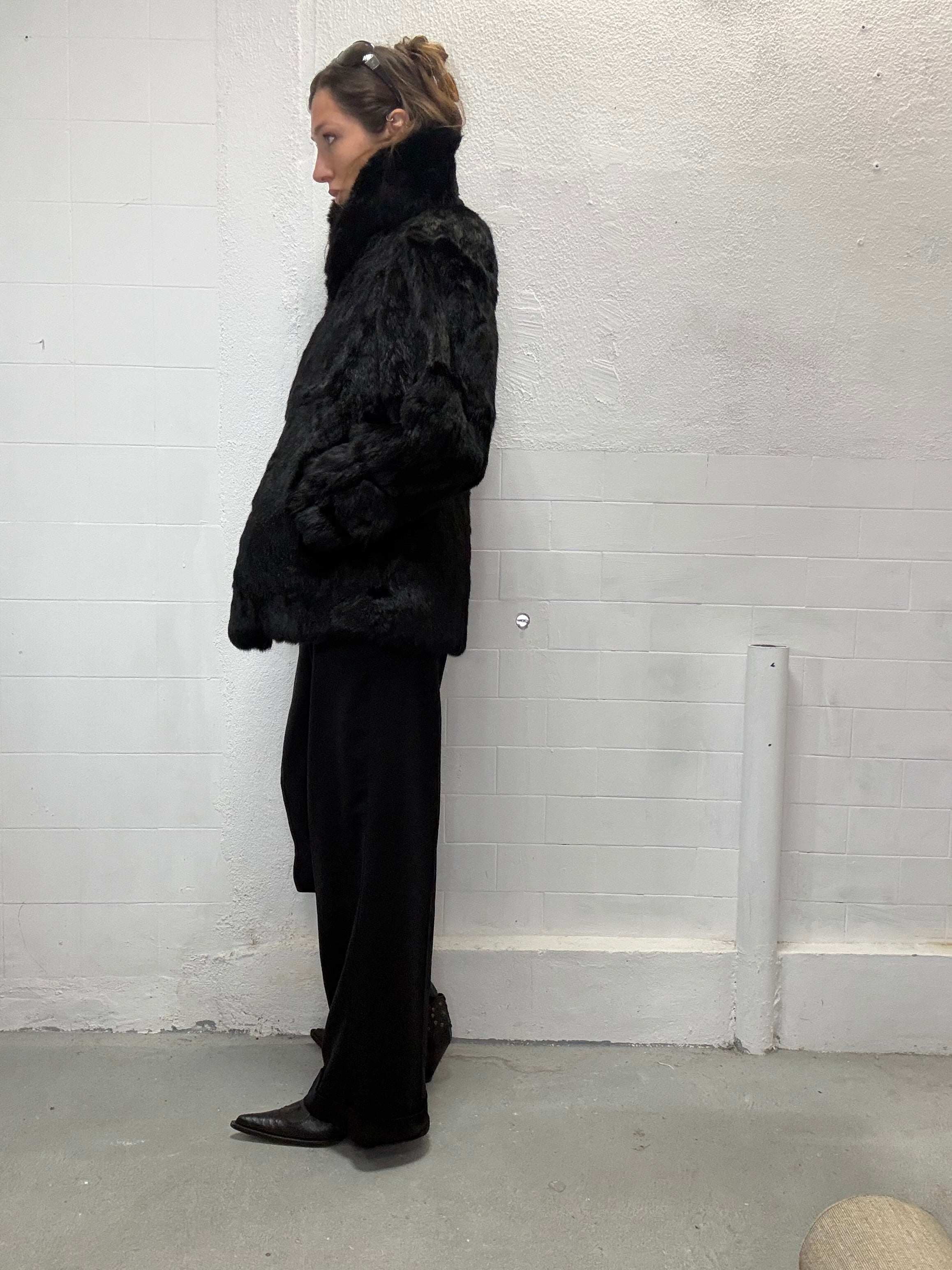 Luxury black fur jacket with plush texture and relaxed silhouette