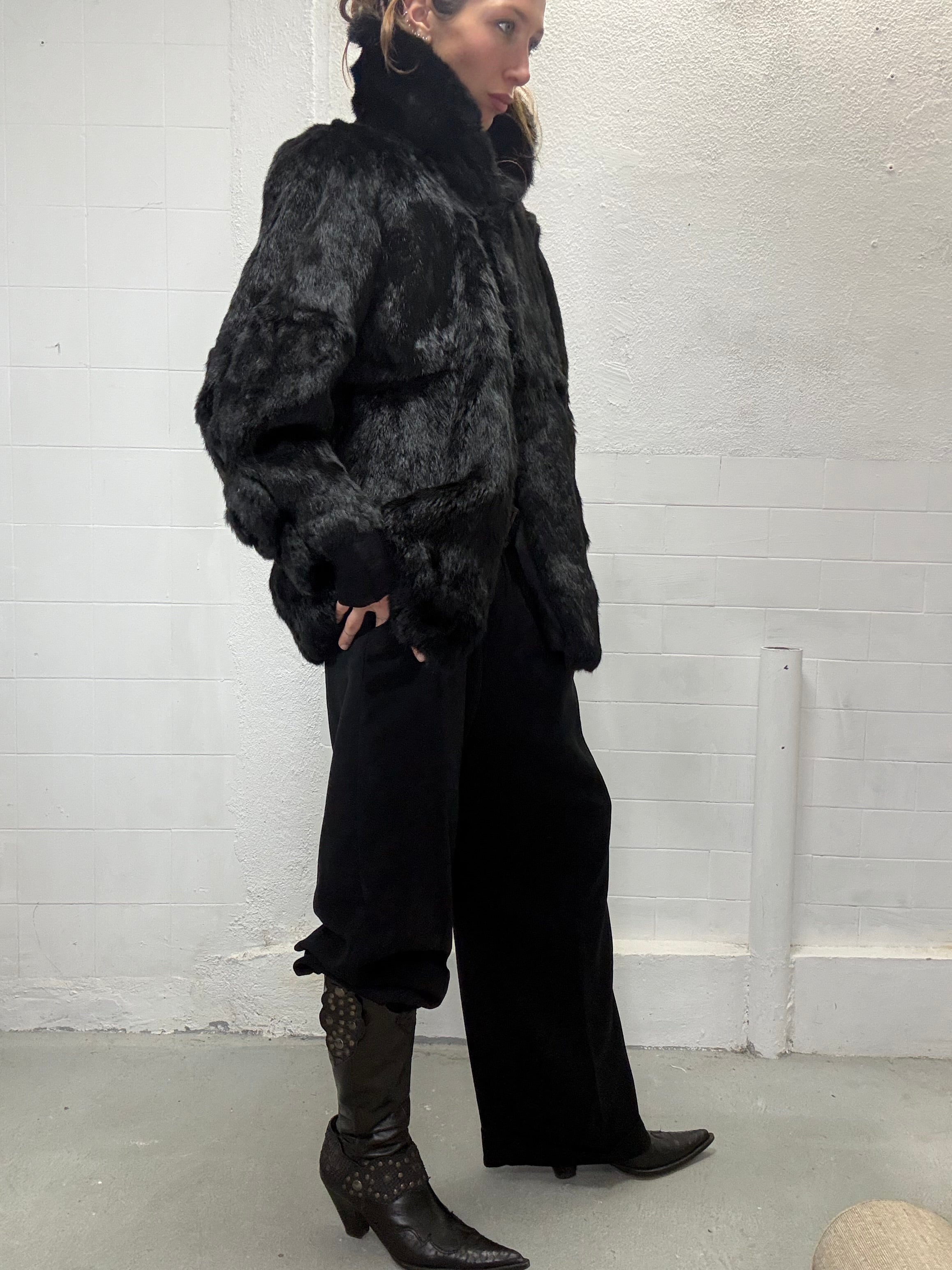 Real fur black coat shown on model, relaxed fit with rich texture