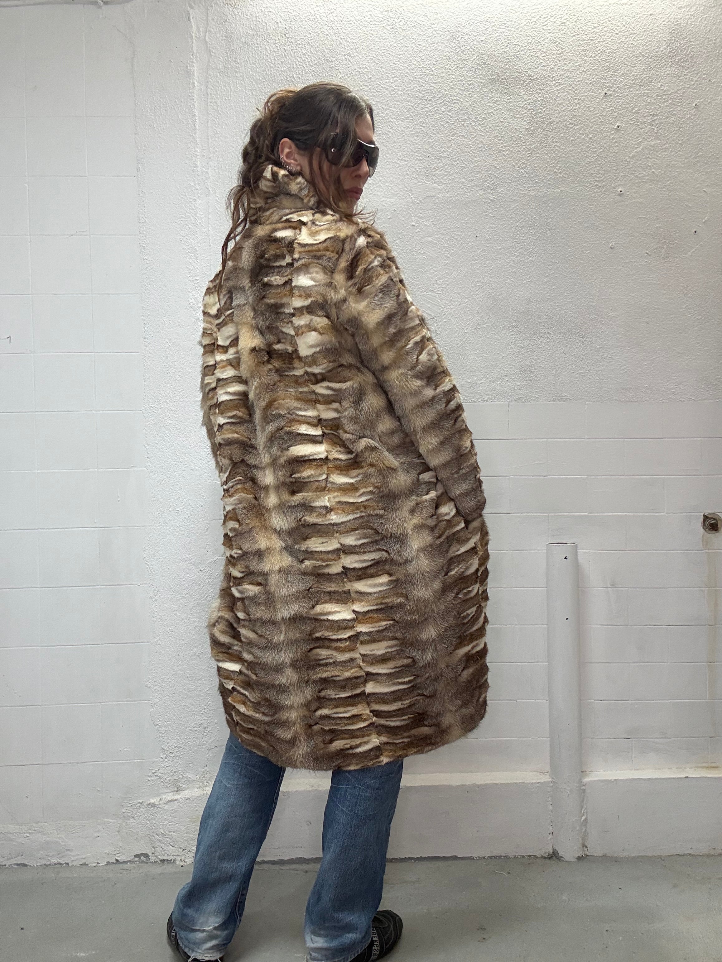 Brown toned real fur coat back view shot
