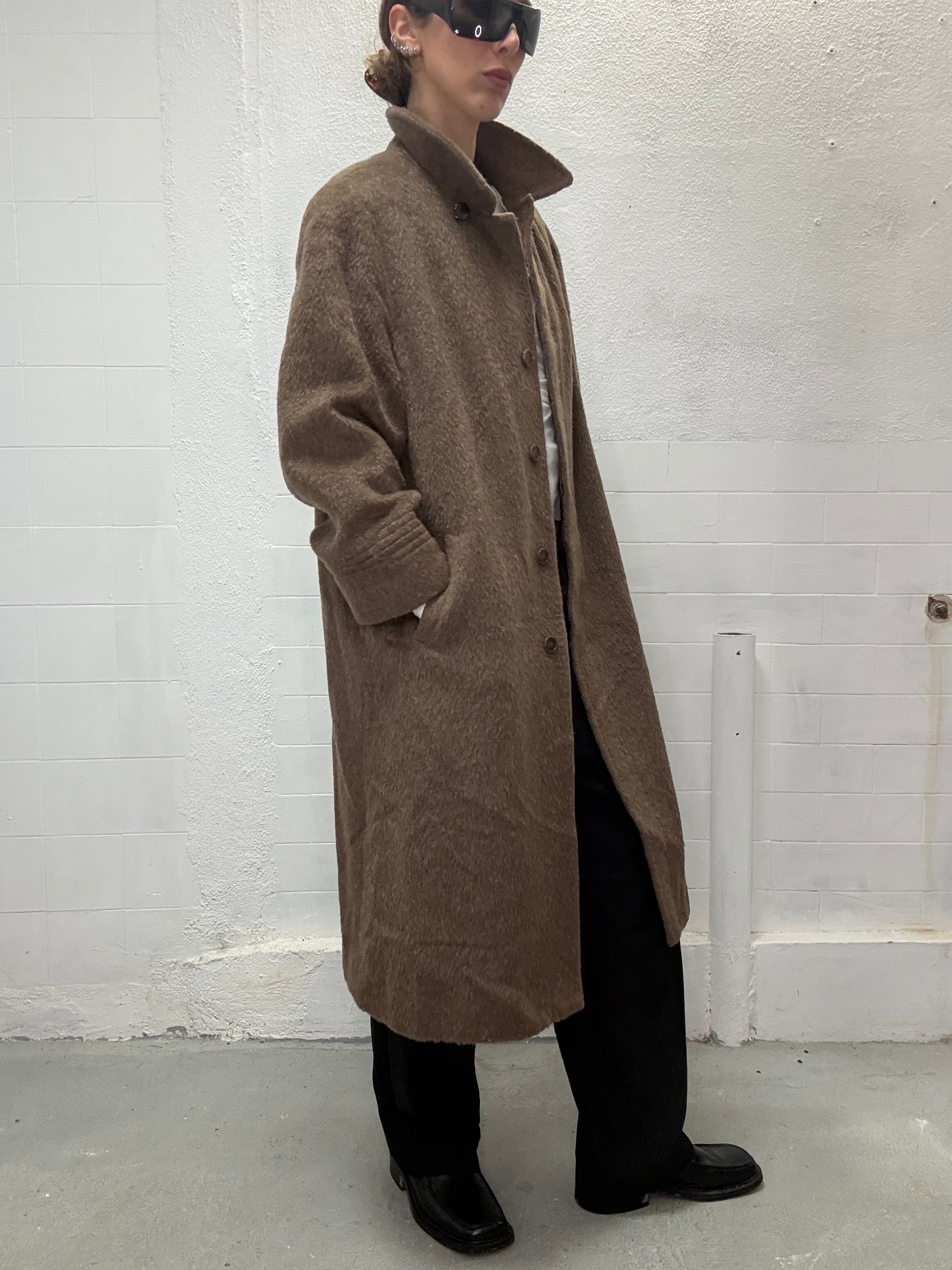 Model wearing oversized brown wool coat