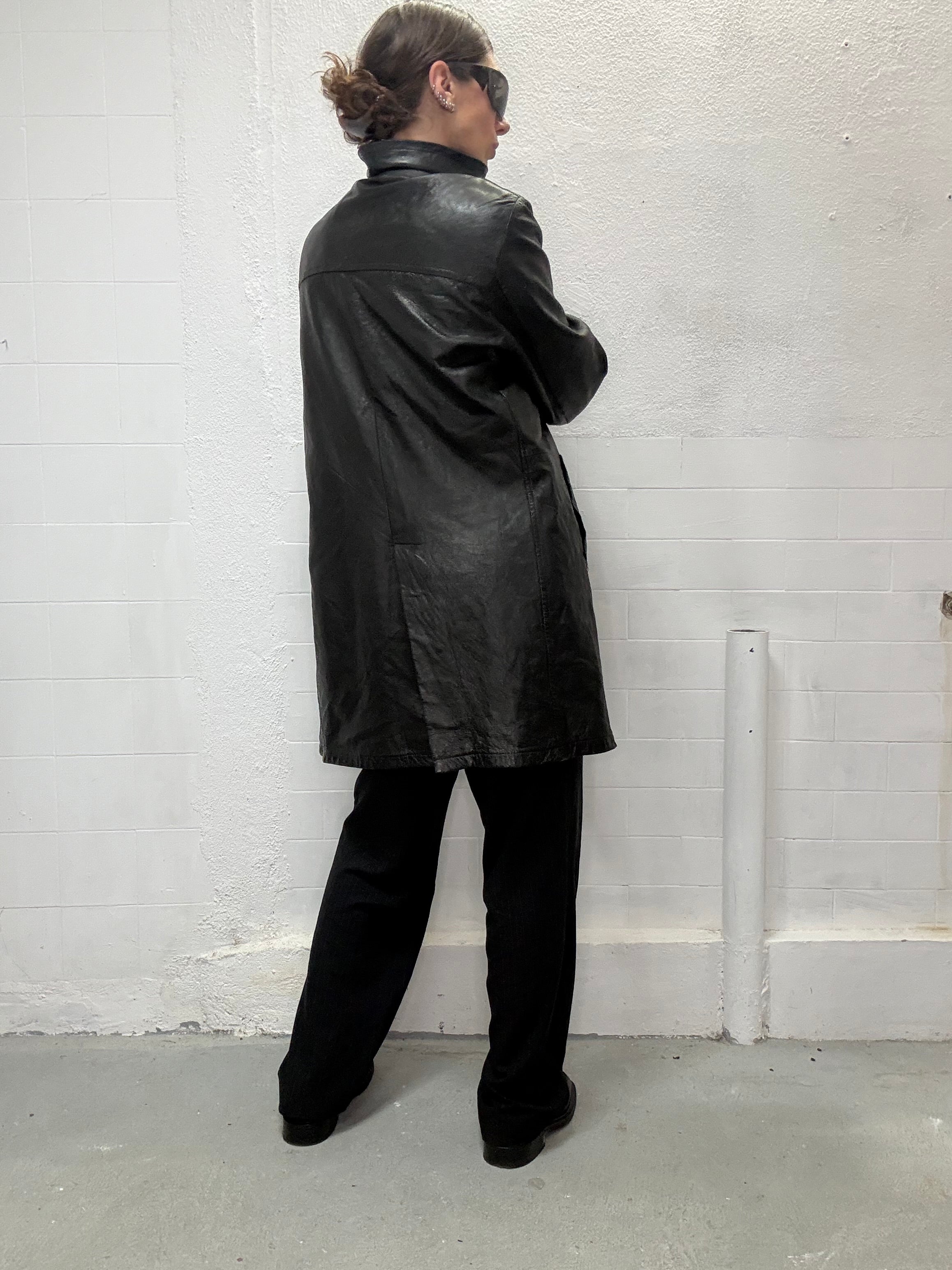 Real leather black trench coat street style back view